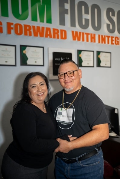 Isaac Palacios and team member at Maximum Score Builders office